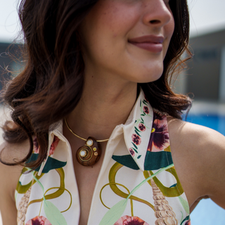 Gold plated Hasli choker necklace with teak wood shell shaped pendant & white & gold stone accents 