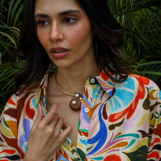 Gold plated Hasli choker necklace with teak wood shell shaped pendant & white & gold stone accents 