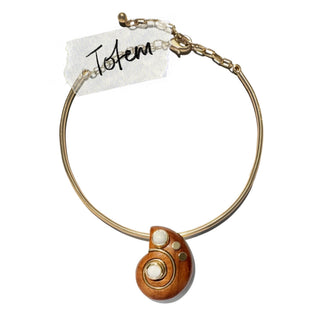Gold plated Hasli choker necklace with teak wood shell shaped pendant & white & gold stone accents 